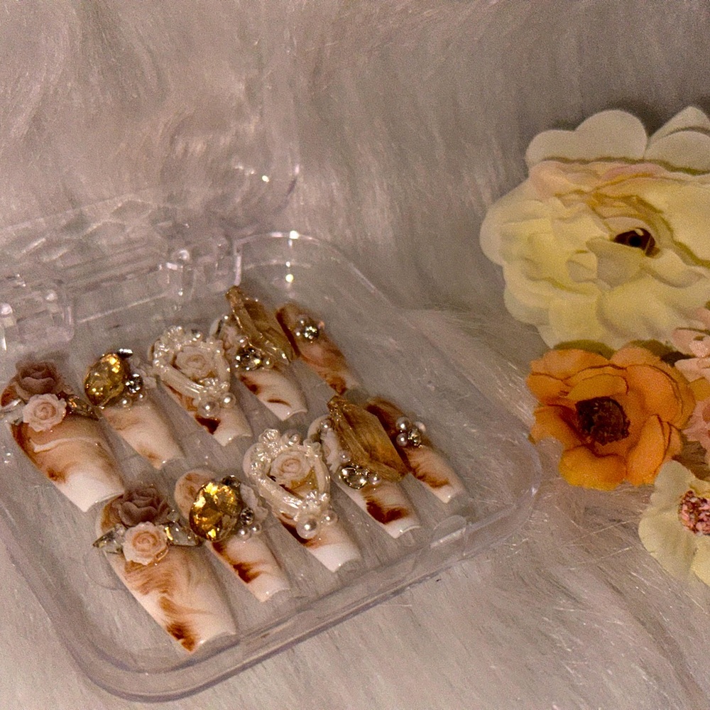 "Luxurious Marble and Gold Nail Set with Pearl Accents"